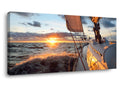 Yacht Sailing in Sea at Sunset Canvas Art